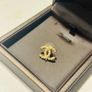 CHANEL Gold Logo Brooch